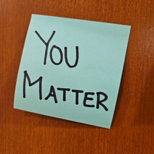 Blue sticky note with the words You Matter written on them